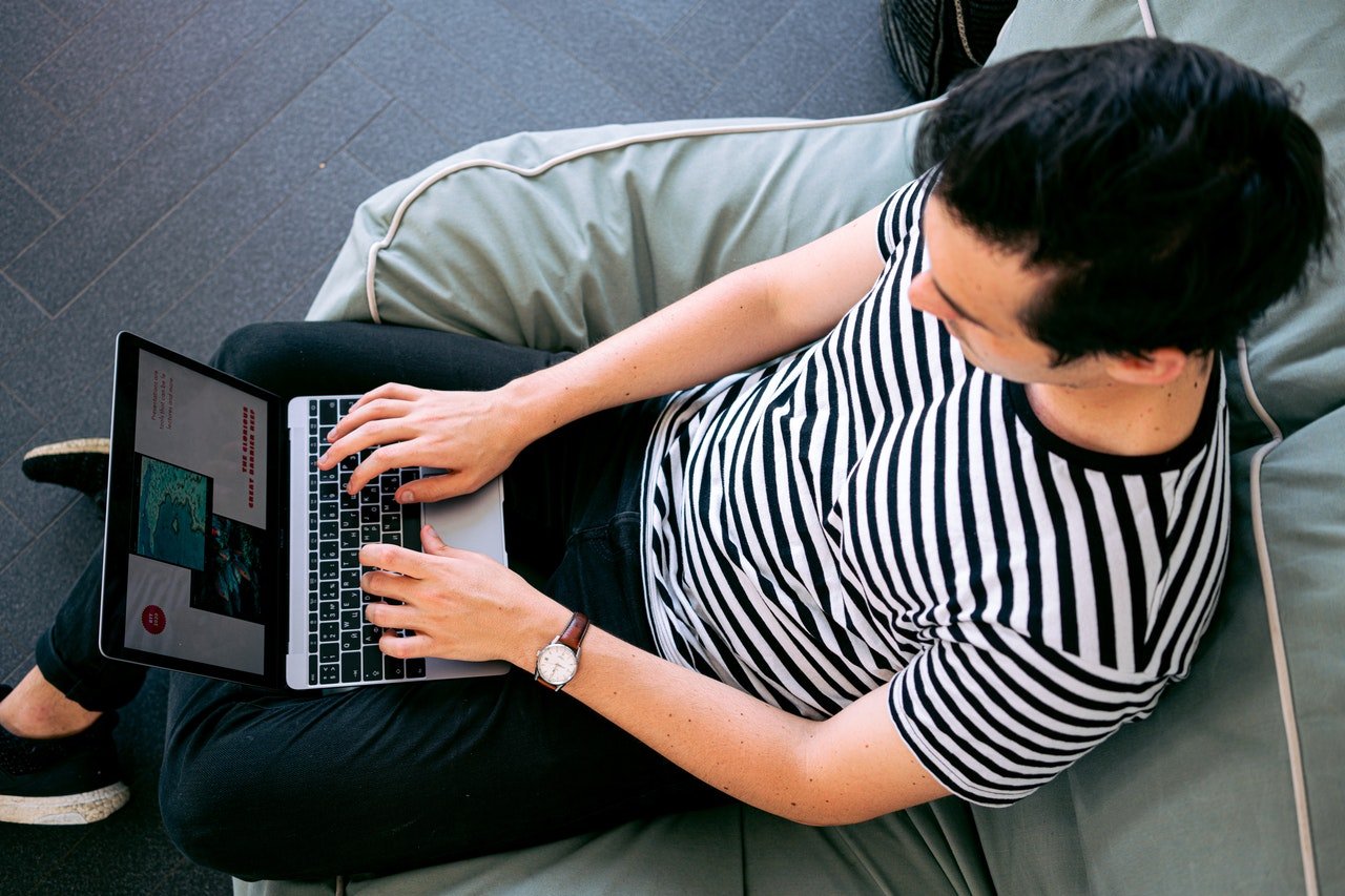 Website updating by a guy sitting on it